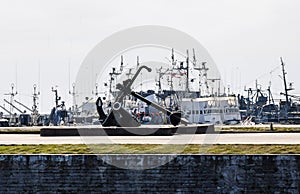 anchor on the pier in the port of Kronstadt and standing on the RAID ships and boats, the Gulf of Finland,
